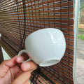 white ceramic mug