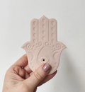 The Hamsa Hand is a universal sign of protection, power and strength. May your Hamsa Hand bring you an aura of protection, love, light and luck to your home . The word “Hamsa” means “five,” representing the fingers of the right hand. For Hindus and Buddhists, it symbolises chakras, energy flow in the body, the five senses.