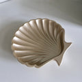 Decorative shell-shaped object on a white background
